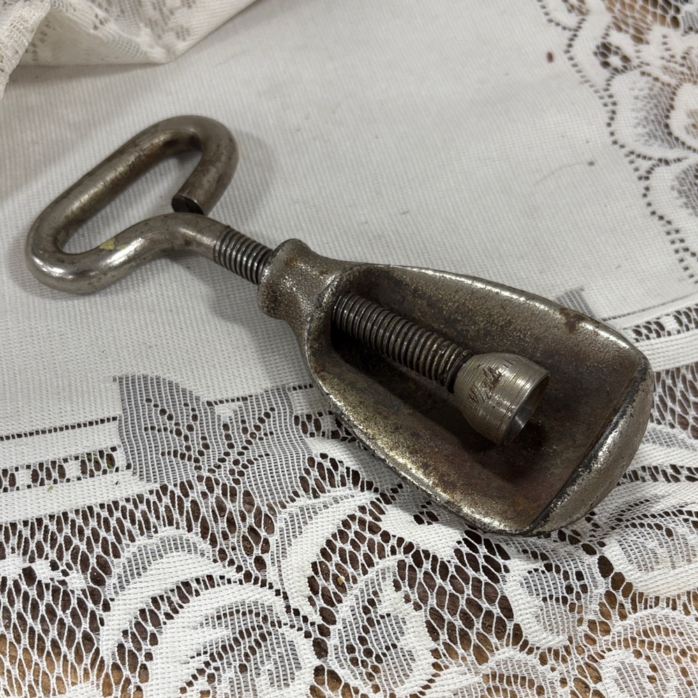 antique cast-iron screw-type nutcracker
